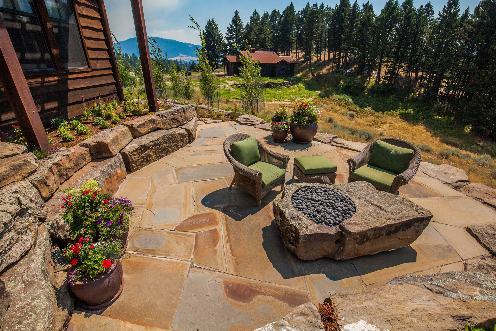 outdoor seating area on rock patio